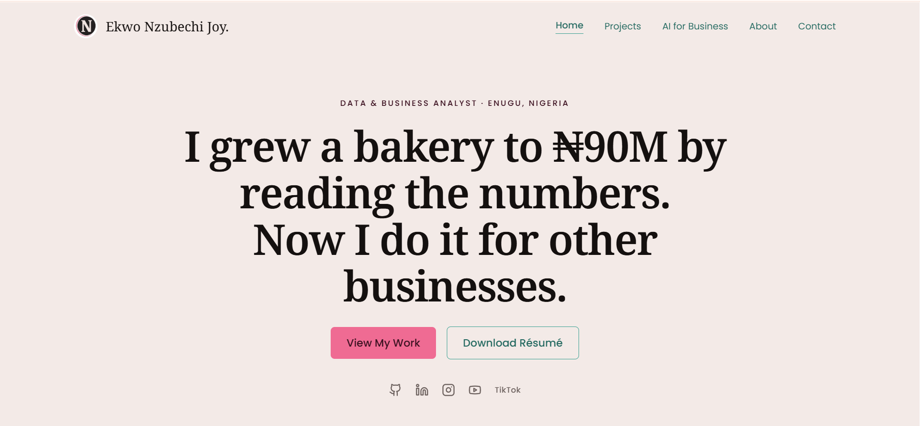 Portfolio home page with a serif headline, warm cream background, and pink CTA button.